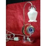  Really rare Art Déco chromed lamp with pocket watch. Enameled clock face. Minute repetition on...