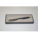 Black Quill Pen with Rolls-Royce Logo at Top