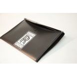 Brand new plastic file folder with a cut out Rolls-Royce logo sticker.