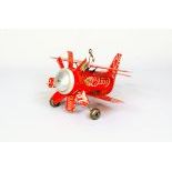 Hangable biplane toy made from Coca-Cola cans