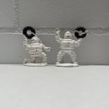 A Set of 2 Cast Iron Michelin Bibendum Figures