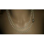 Marilyn Monroe (1926 - 1962). Necklace with two rows of pearls. Vintage movie or travel jewelry of the famous actress