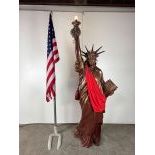 Lot of Statue of Liberty Decoration with an American Flag on a Stand