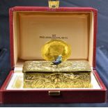 Singing bird box, gilded, with original box and key. Very good condition.